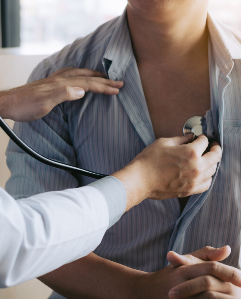 Photo of a woman at an annual wellness visit with her doctor
