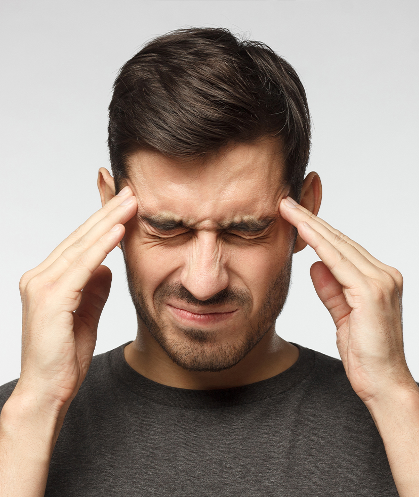 Photo of a man with a headache