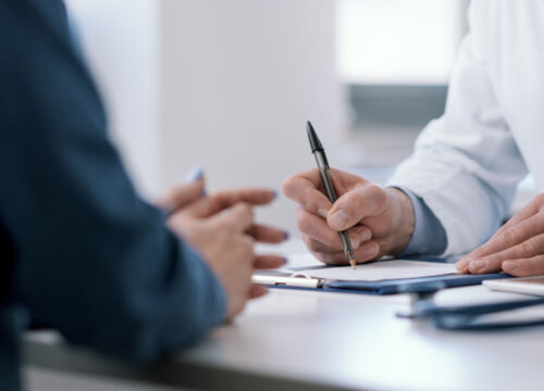 Photo of a doctor and patient during annual wellness visits
